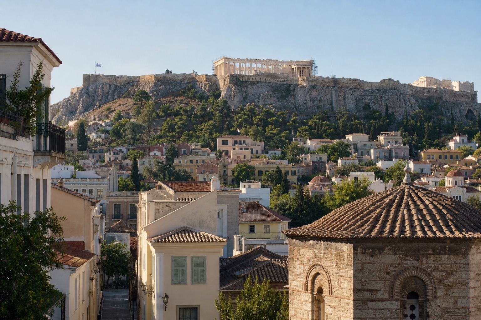Athens neighborhood rooftops below the Acropolis in clear morning light