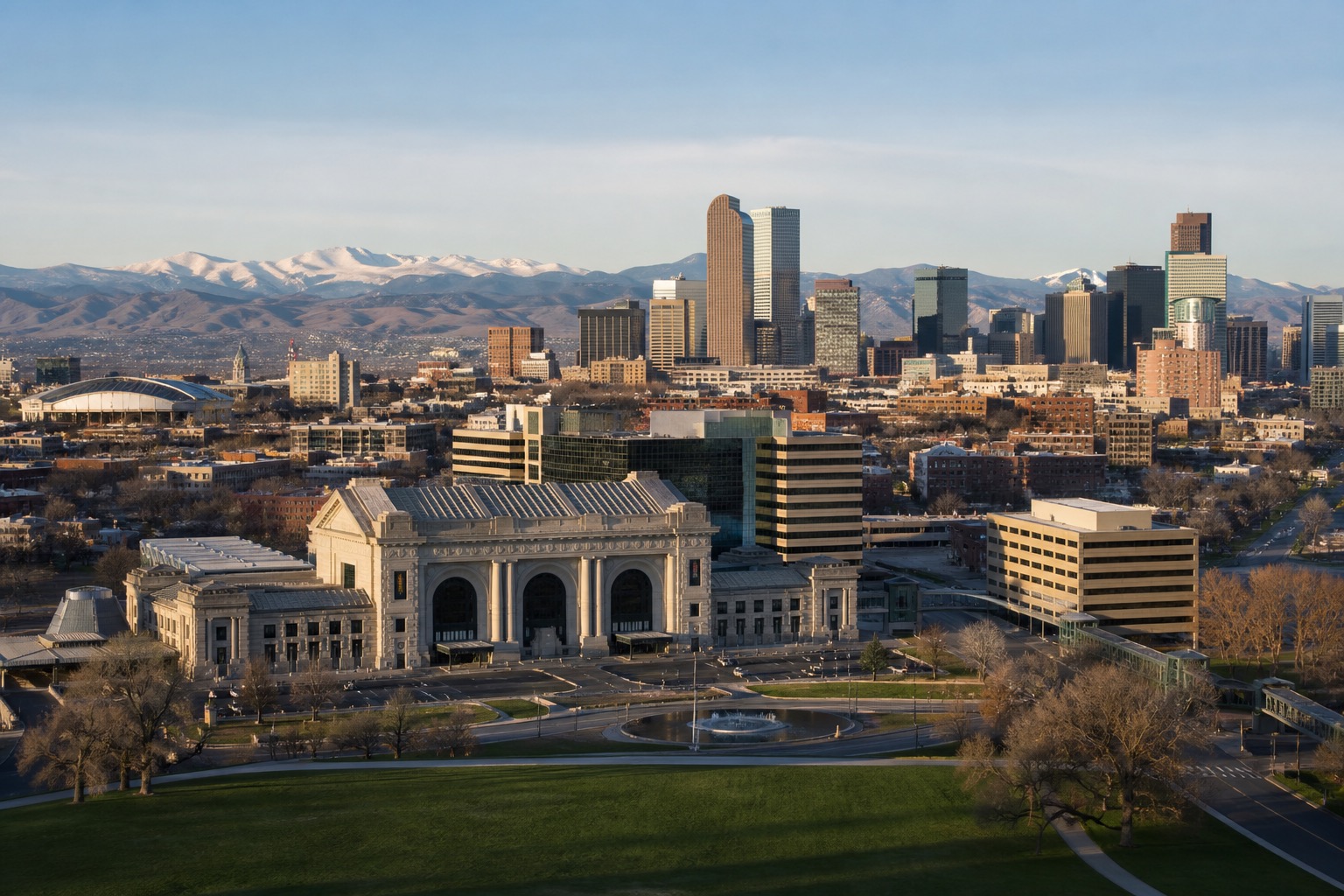 Denver skyline and civic architecture with the Front Range visible in clear morning light