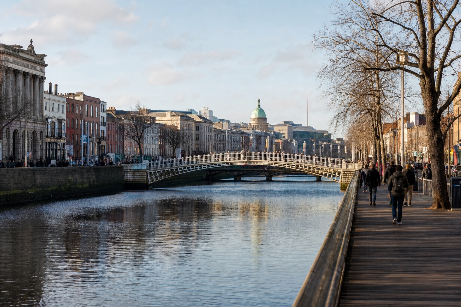 The River Liffey, Ha'penny Bridge, and central Dublin in soft morning light