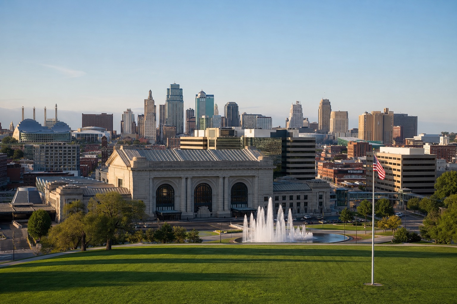 Kansas City skyline and fountains with warm evening light and no visible branding