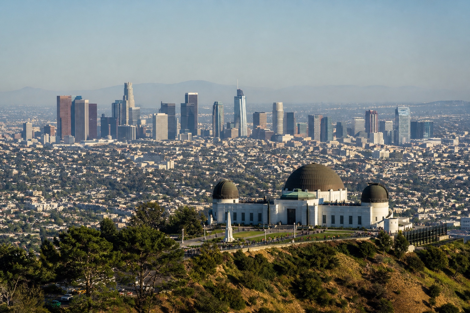 Griffith Observatory above Los Angeles with the downtown skyline across the city basin