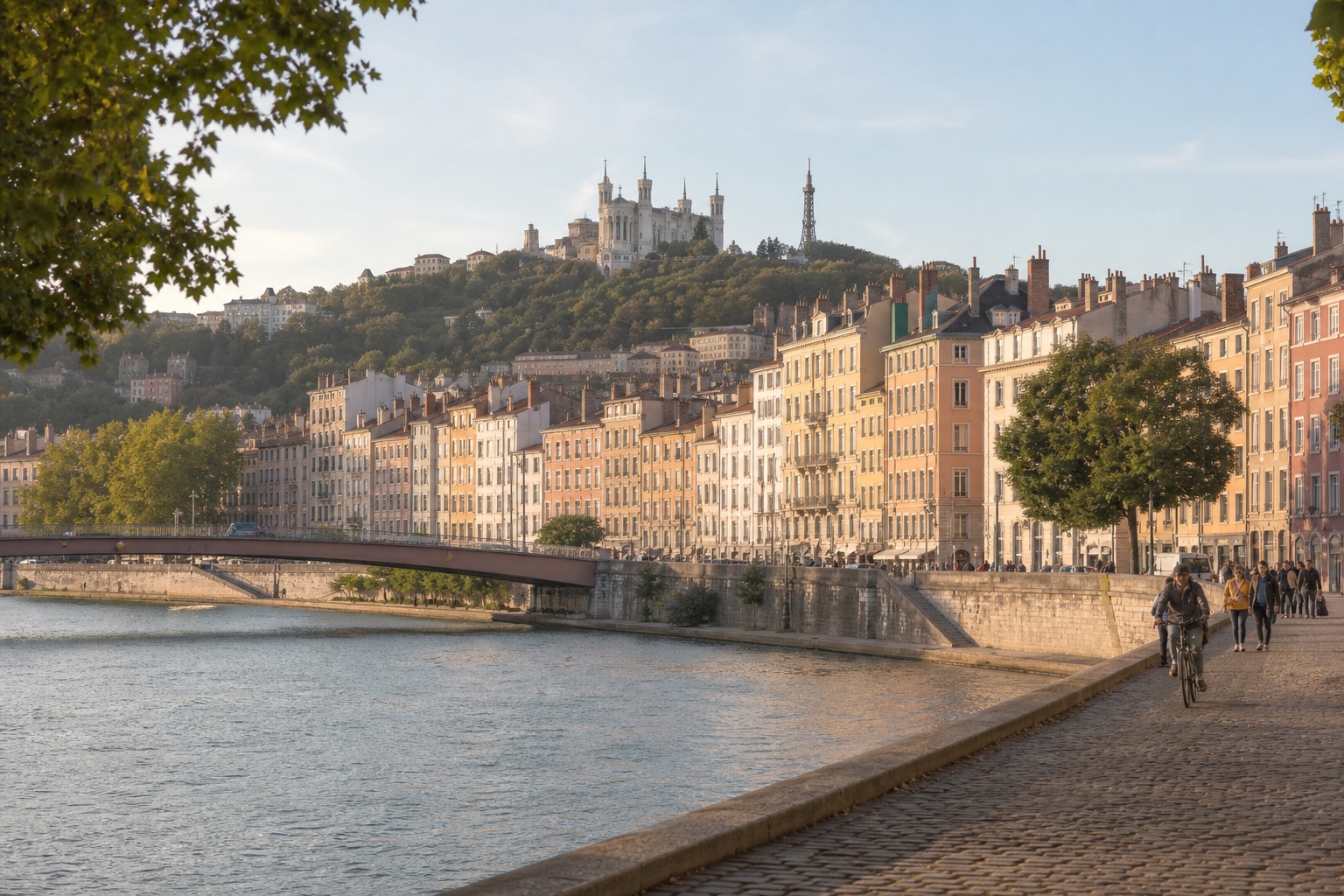 Lyon's old city and Saône river beneath Fourvière hill in warm clear light