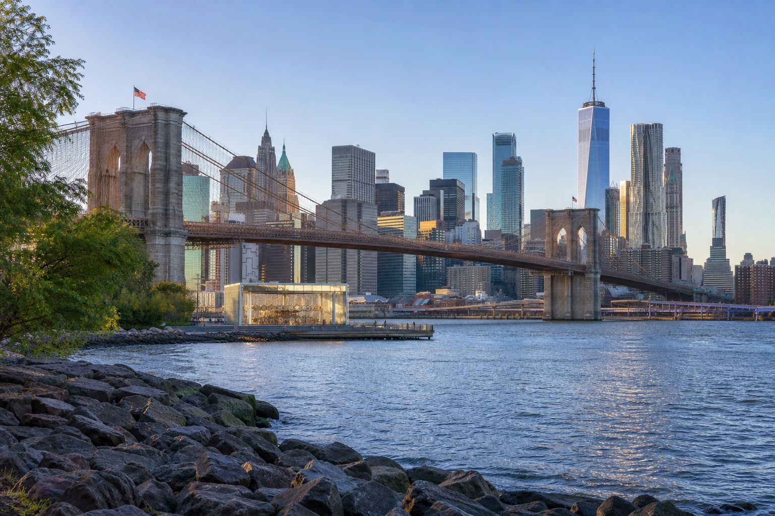 The Brooklyn Bridge crossing the East River toward Lower Manhattan in clear morning light