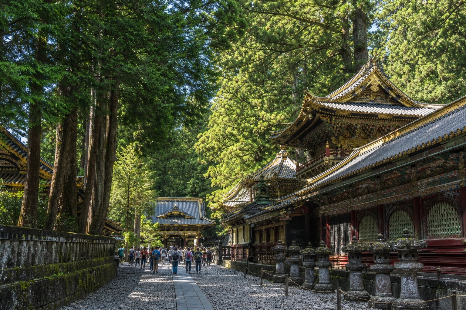 The richly decorated Tōshō-gū shrine complex among tall cedars in Nikkō