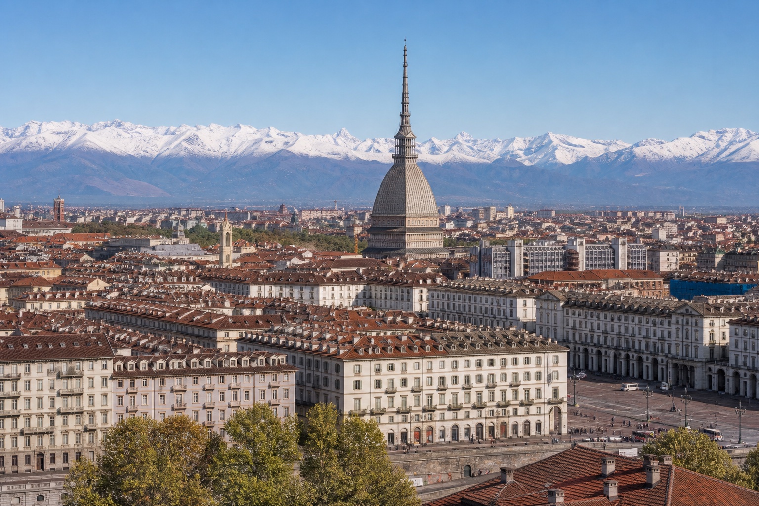 Turin's arcaded Piazza Castello and Mole Antonelliana with the Alps visible beyond the city