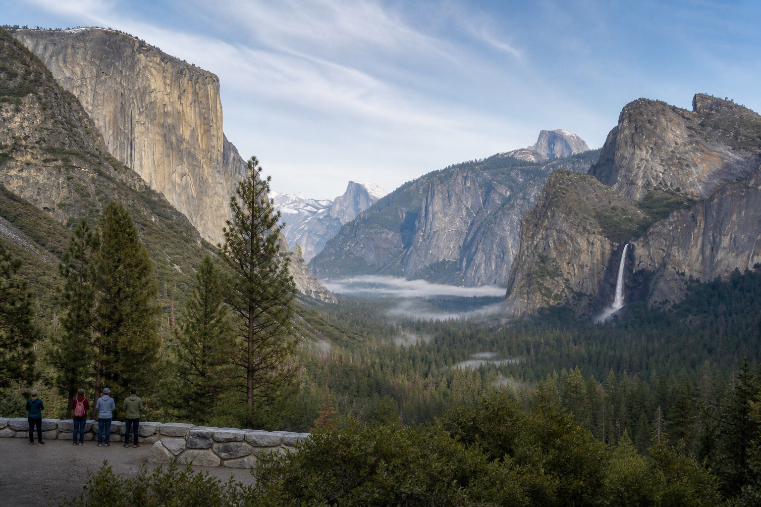 Yosemite Valley with El Capitan, Half Dome, Bridalveil Fall and visitors at a maintained viewpoint